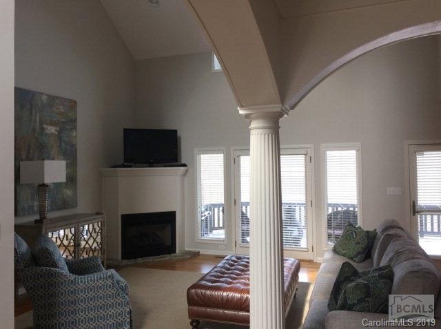 1331 Bethel Road Morganton, NC 28655 - Photo 3 of 10 a living room with furniture a fireplace and a flat screen tv