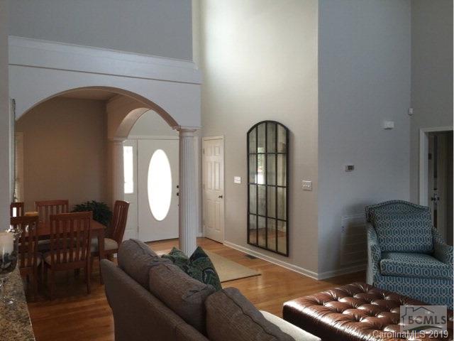 1331 Bethel Road Morganton, NC 28655 - Photo 4 of 10 a living room with furniture and a mirror