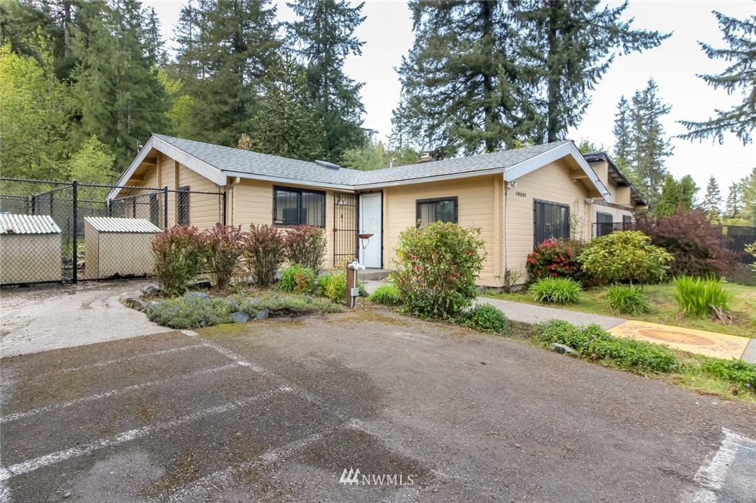 19861 Renton-Maple Valley Road Renton, WA 98058 - Photo 2 of 32 a front view of house with yard and green space