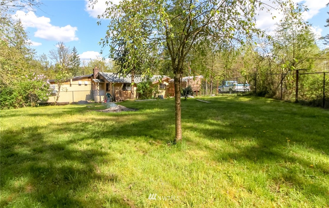 19861 Renton-Maple Valley Road Renton, WA 98058 - Photo 32 of 32 a view of a big yard with large trees