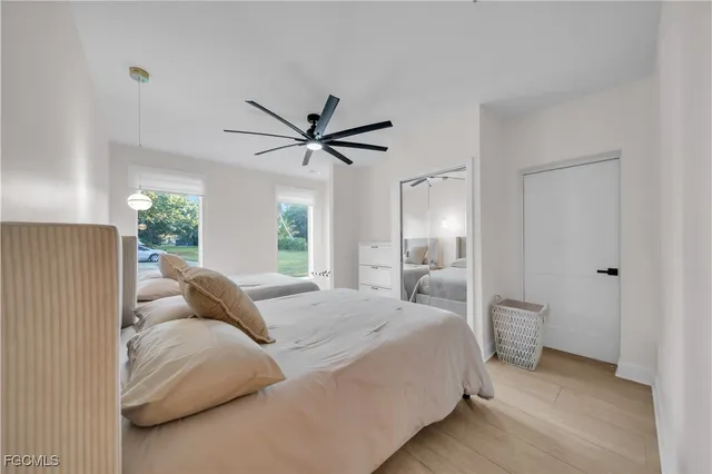 an aerial view of a house with a garden and swimming pool