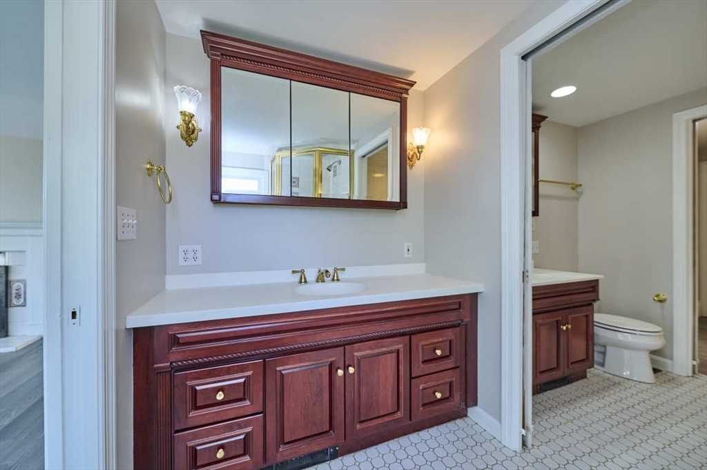 97 River Road Merrimac, MA 01860 - Photo 31 of 42 a bathroom with a sink and a mirror