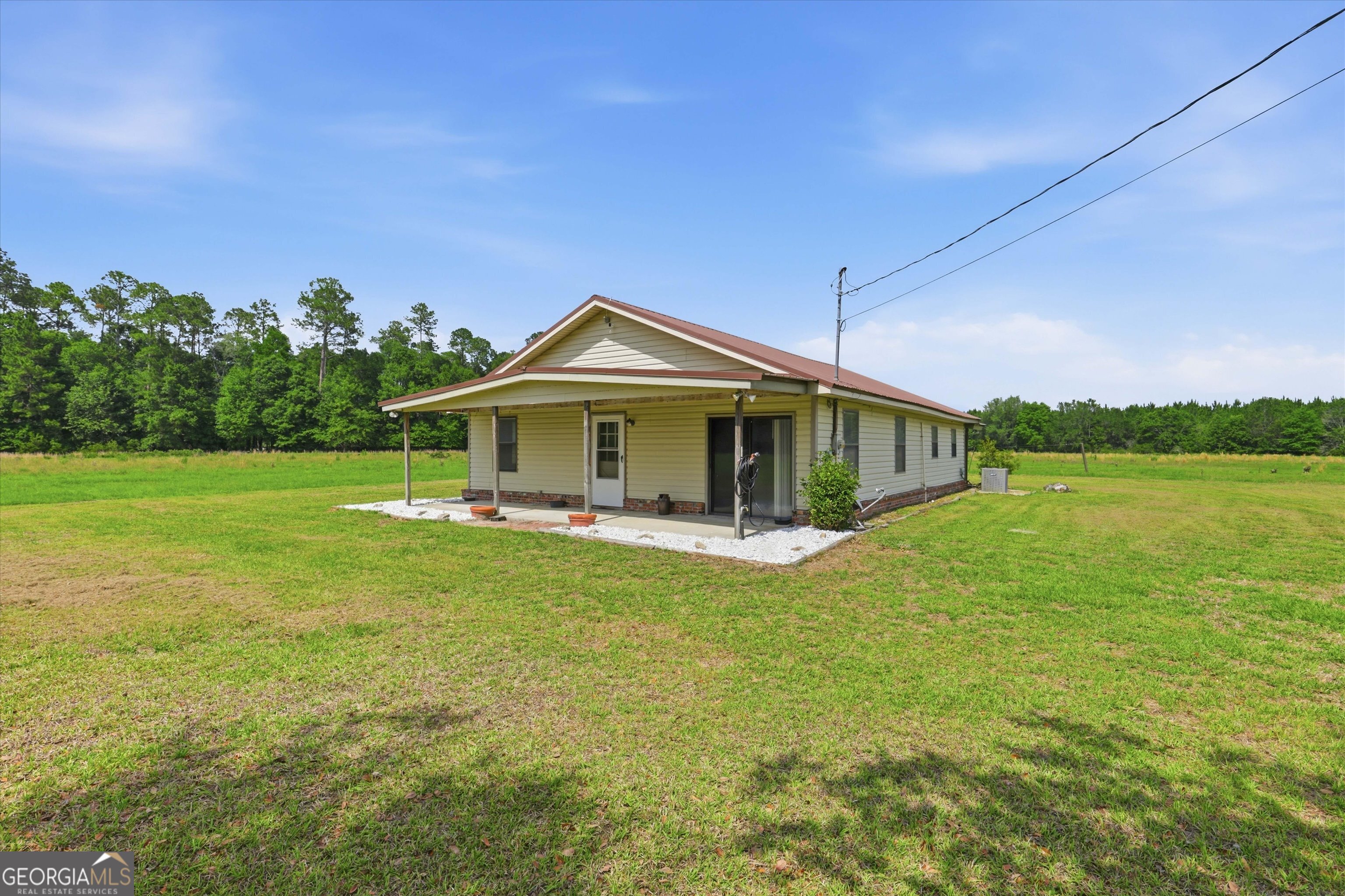 1525 Myron Hart Road Coolidge, GA 31738 - Photo 4 of 58 a view of a house with a yard balcony and sitting area