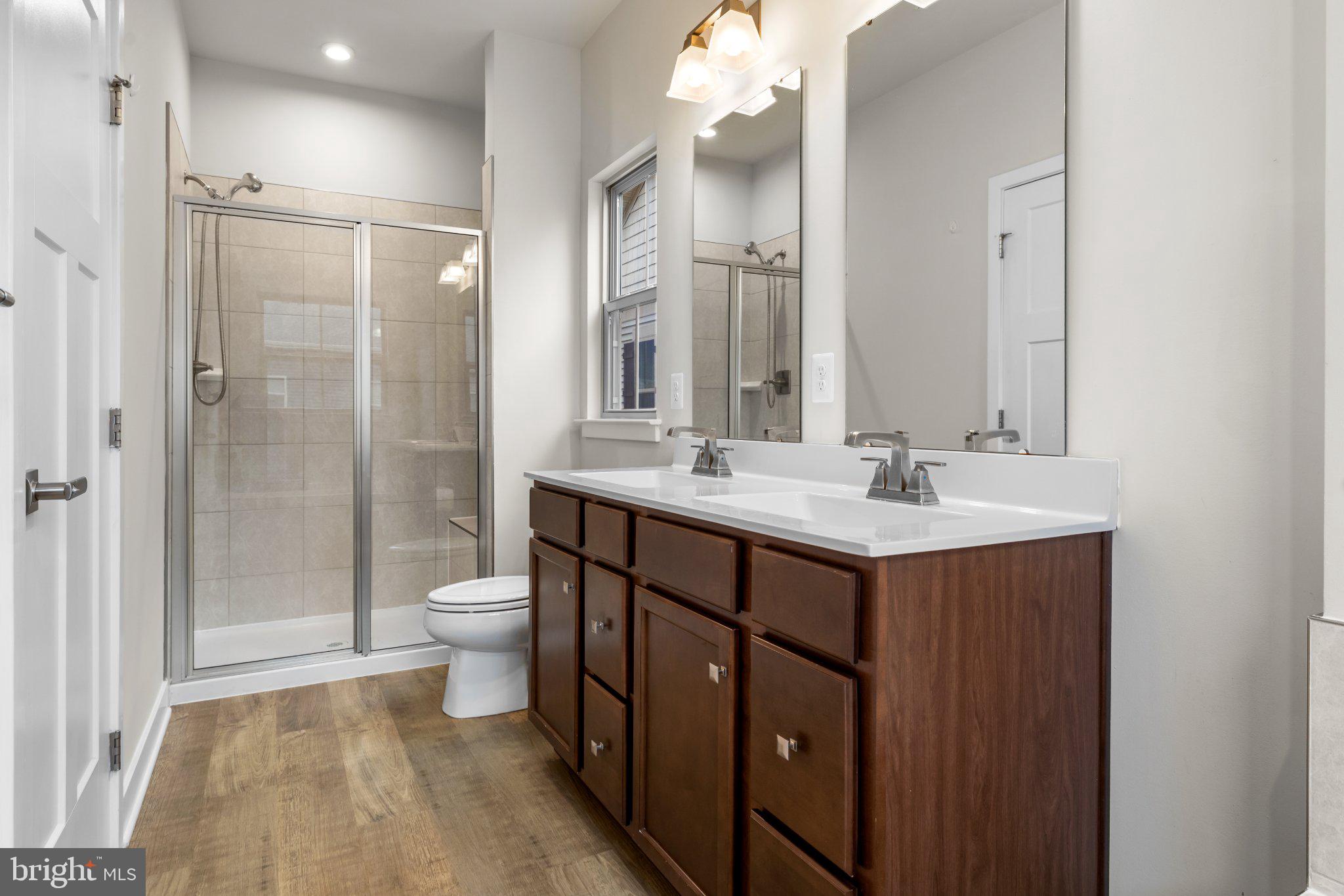 117 Hawlings River Road Laurel, MD 20708 - Photo 20 of 20 Modern bathroom with dual vanities.