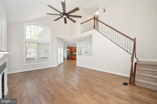 a view of a dining room furniture and wooden floor
