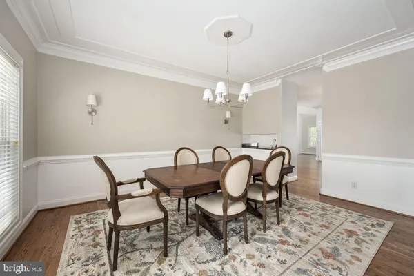 a bed room with a bed and a television