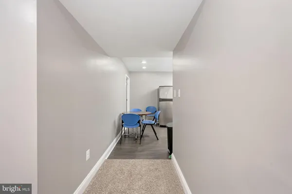 a bathroom with a toilet sink and a shower