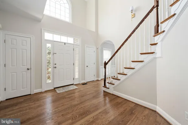a view of entryway with wooden floor