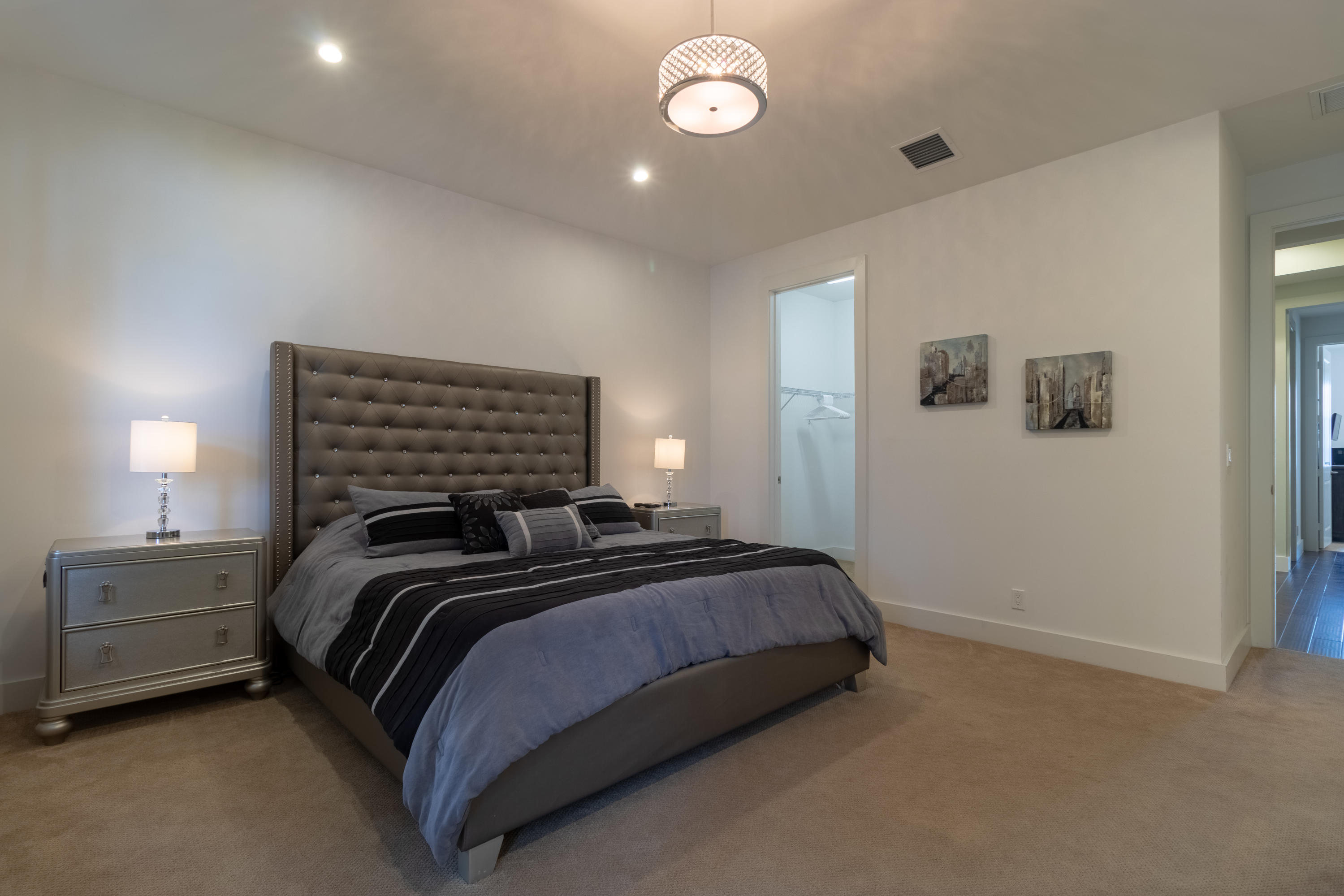 1085 Phillips Road Delray Beach, FL 33483 - Photo 11 of 32 a bedroom with a bed and a window