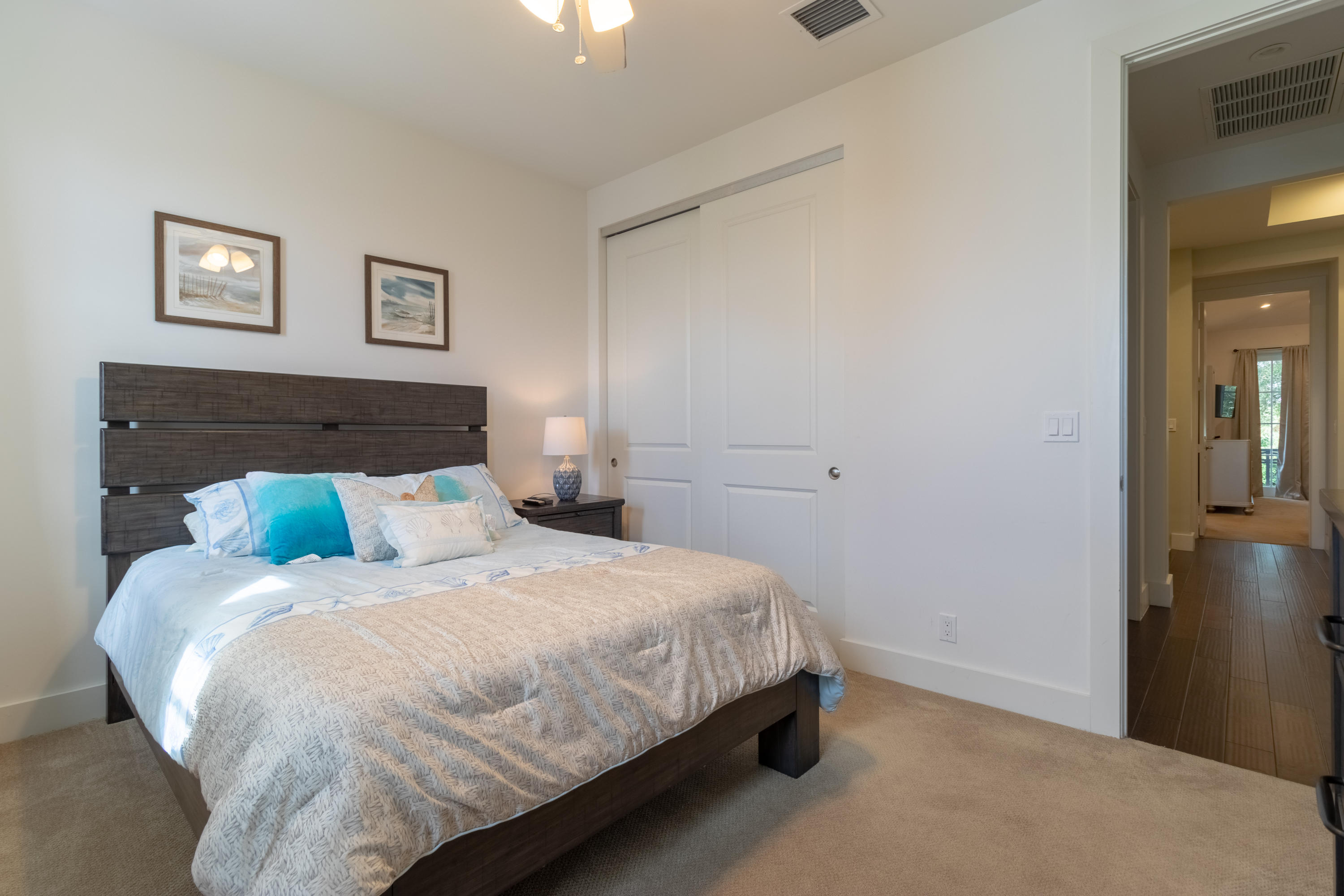 1085 Phillips Road Delray Beach, FL 33483 - Photo 18 of 32 a bedroom with a bed and painting on the wall