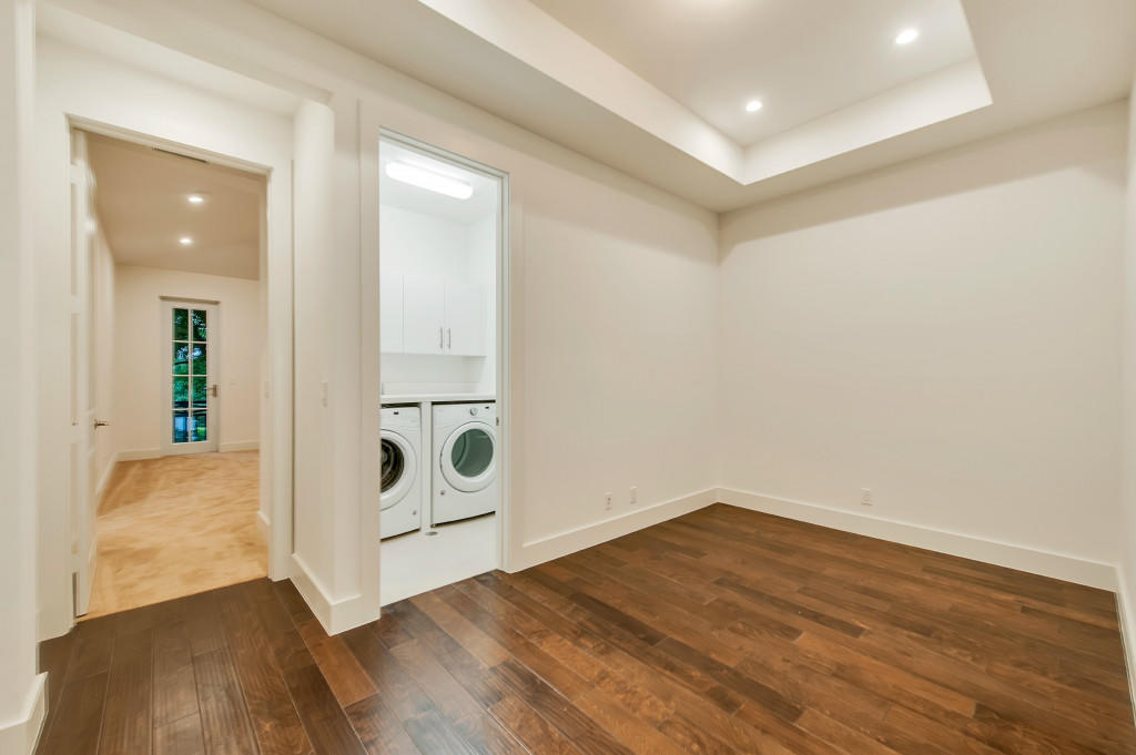 1085 Phillips Road Delray Beach, FL 33483 - Photo 24 of 32 wooden floor in an empty room with a window
