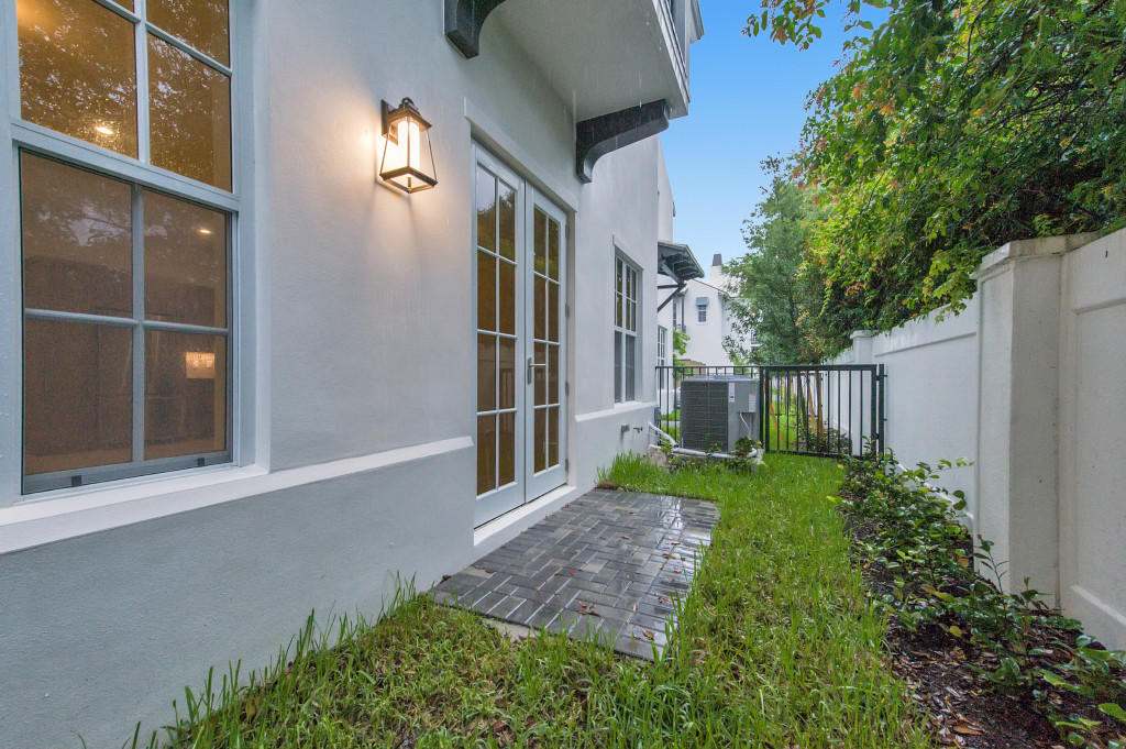 1085 Phillips Road Delray Beach, FL 33483 - Photo 26 of 32 a view of a back yard of the house