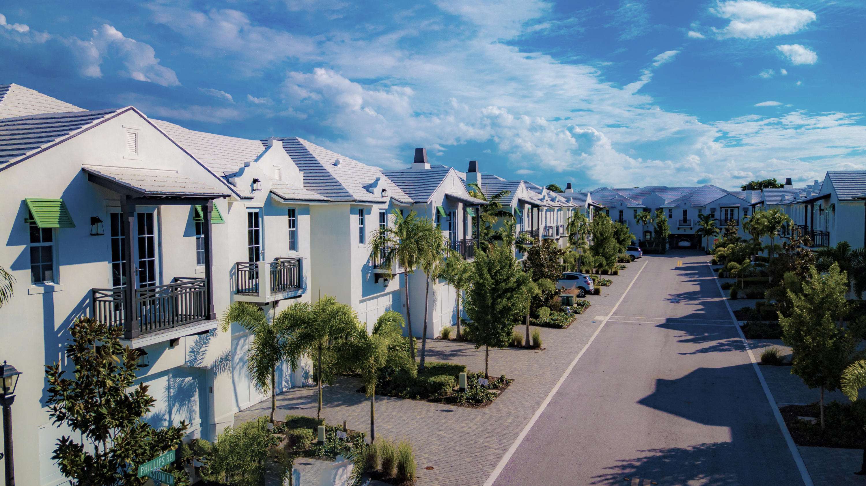 1085 Phillips Road Delray Beach, FL 33483 - Photo 27 of 32 a view of a house with wooden walls and potted plants