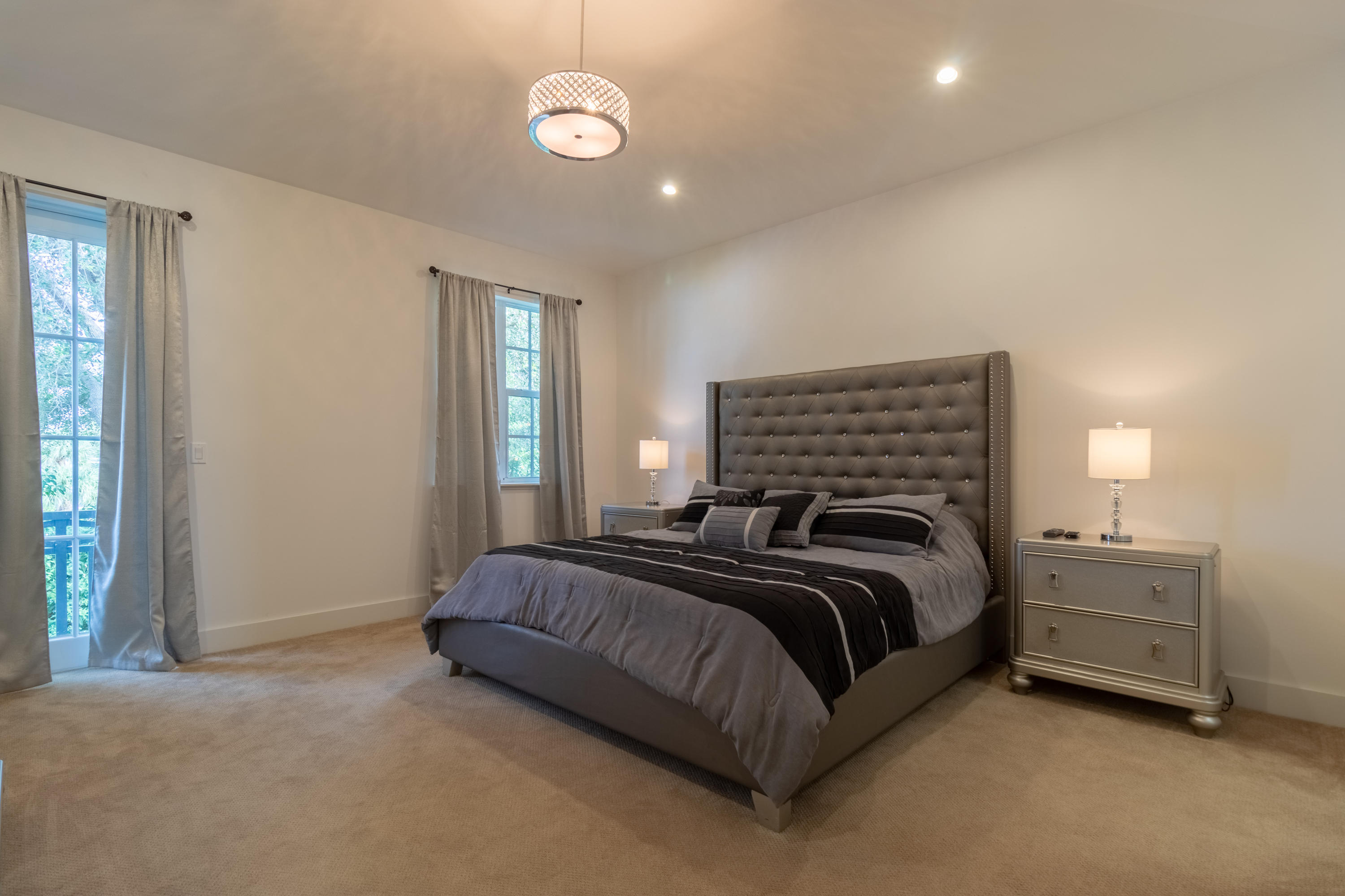 1085 Phillips Road Delray Beach, FL 33483 - Photo 9 of 32 a bedroom with a bed and window