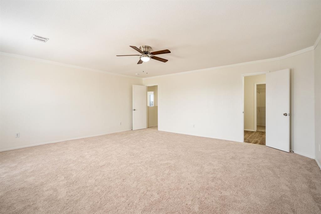 1626 White Oak Road Anna, TX 75409 - Photo 26 of 30 a view of a big room with carpet