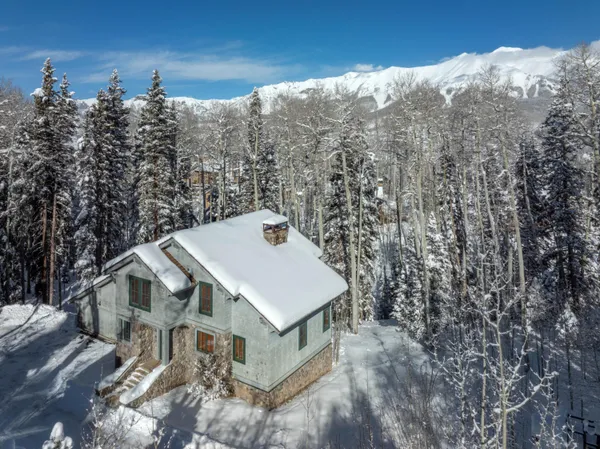 a view of a house with a mountain