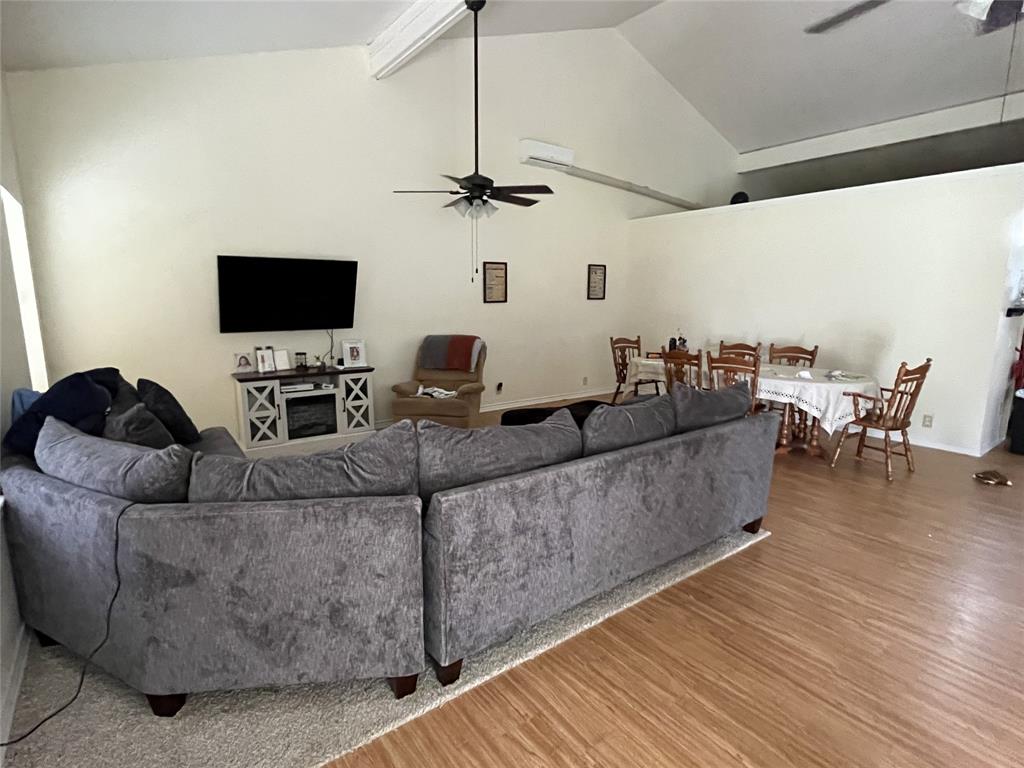 3841 Ledgestone Lane Midlothian, TX 76065 - Photo 7 of 26 a living room with furniture and a flat screen tv