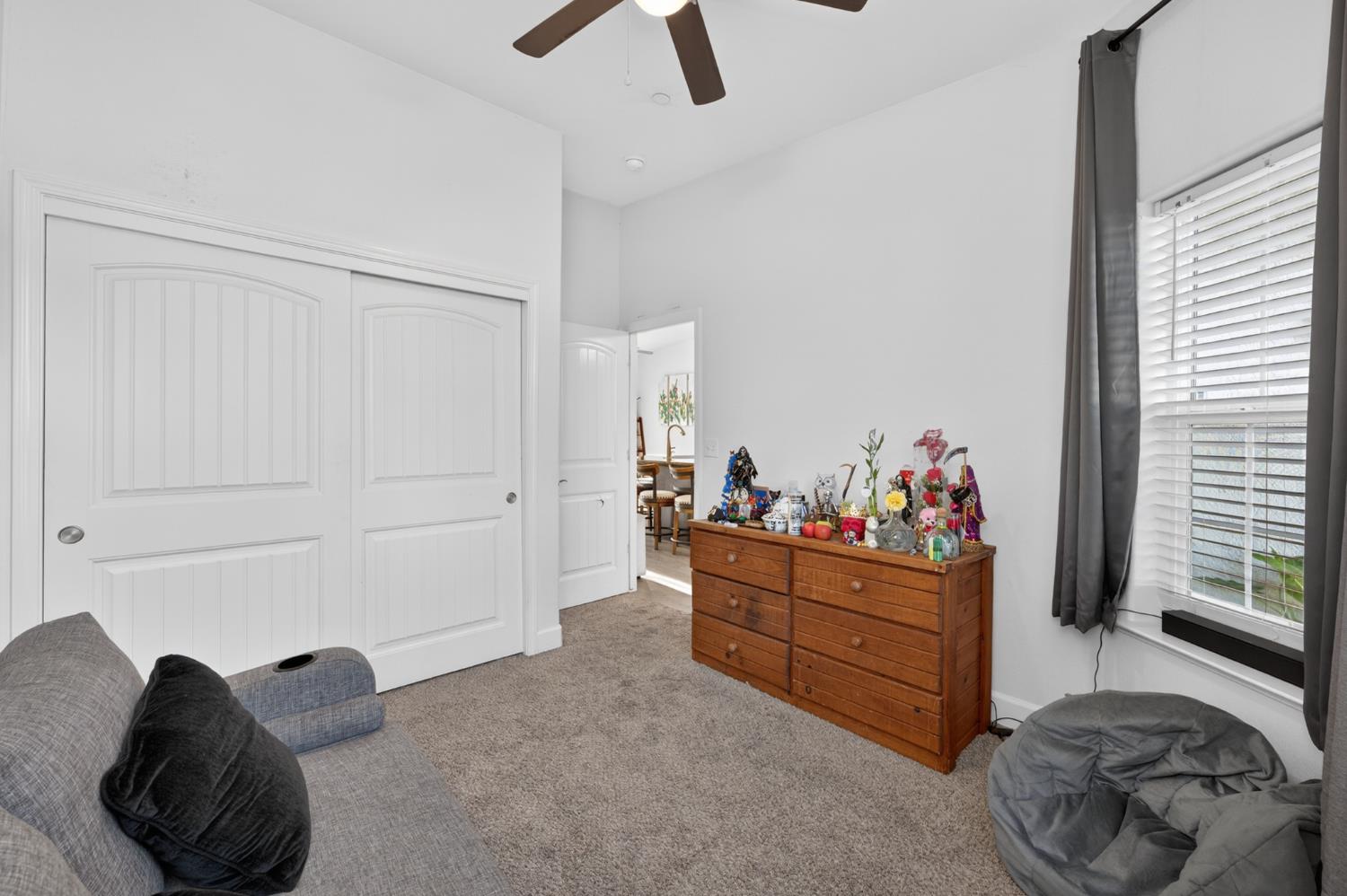 1208 Monterey Street Madera, CA 93637 - Photo 23 of 38 a living room with furniture and a window