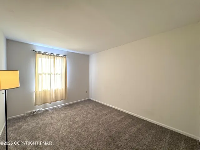 an empty room with an entryway