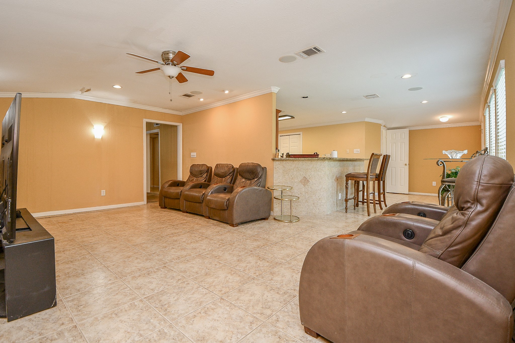 3217 Calumet Street Houston, TX 77004 - Photo 11 of 20 a living room with furniture and kitchen view