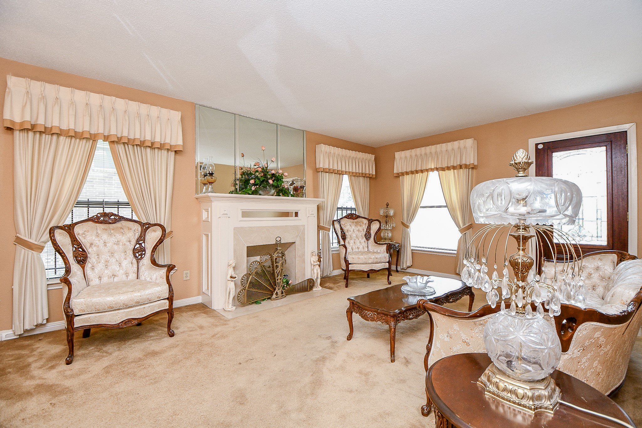 3217 Calumet Street Houston, TX 77004 - Photo 4 of 20 a living room with furniture a fireplace and large windows