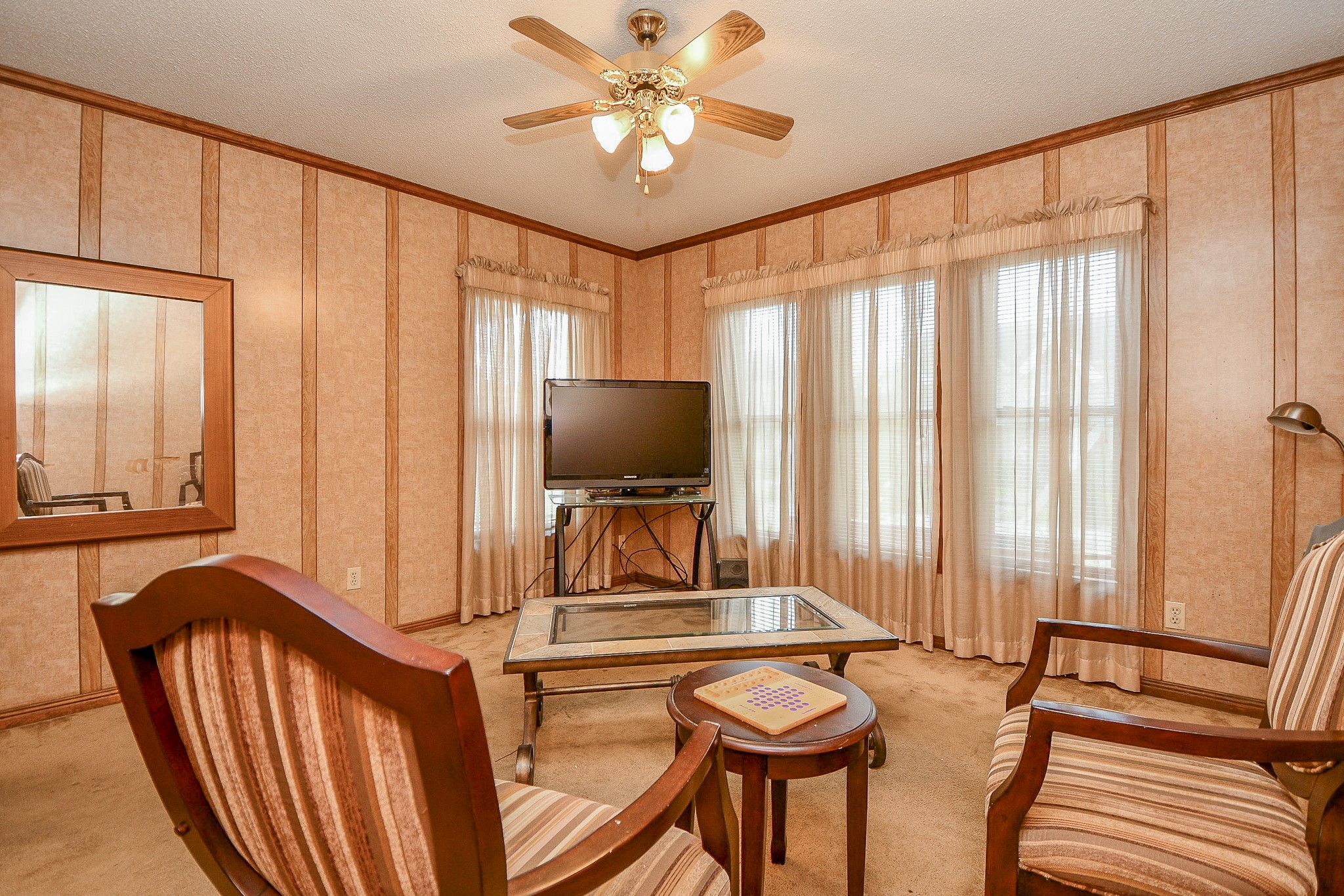 3217 Calumet Street Houston, TX 77004 - Photo 8 of 20 a living room with furniture and a flat screen tv