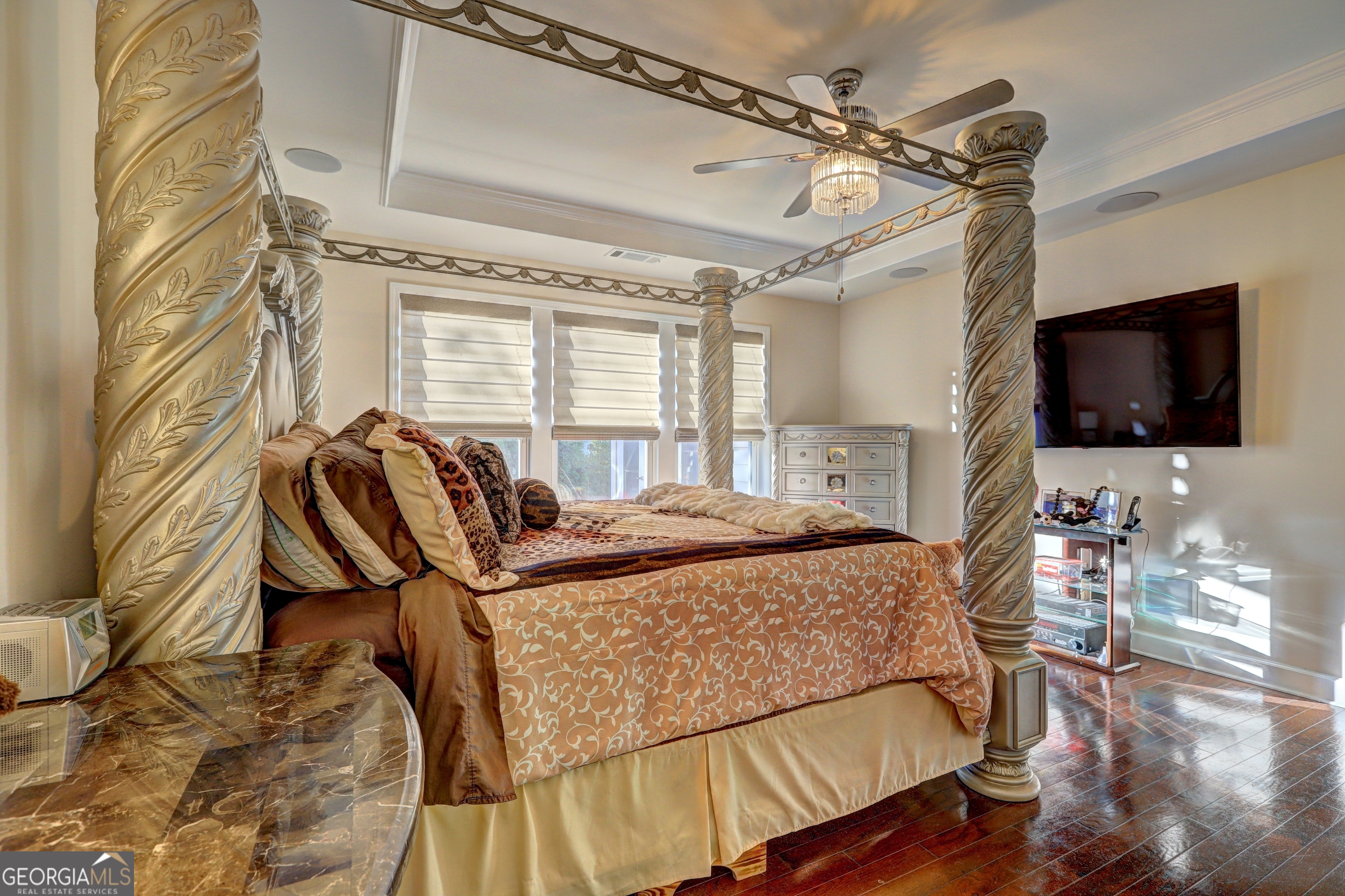 757 Firefly Court Griffin, GA 30223 - Photo 18 of 31 a living room with furniture and a flat screen tv