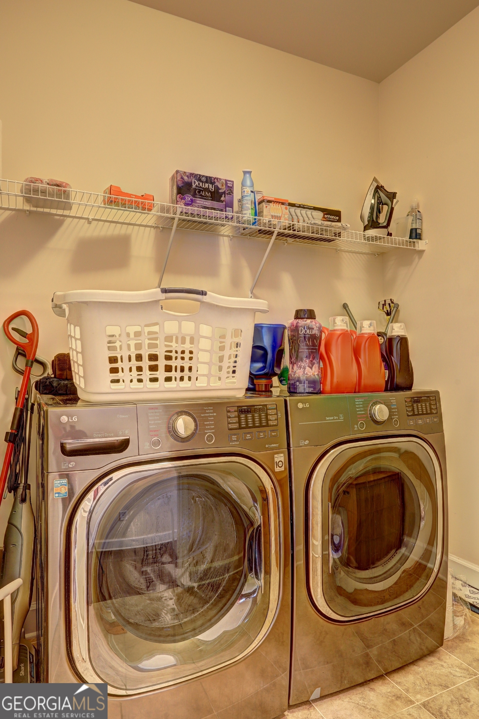 757 Firefly Court Griffin, GA 30223 - Photo 24 of 31 a utility room with dryer and washer