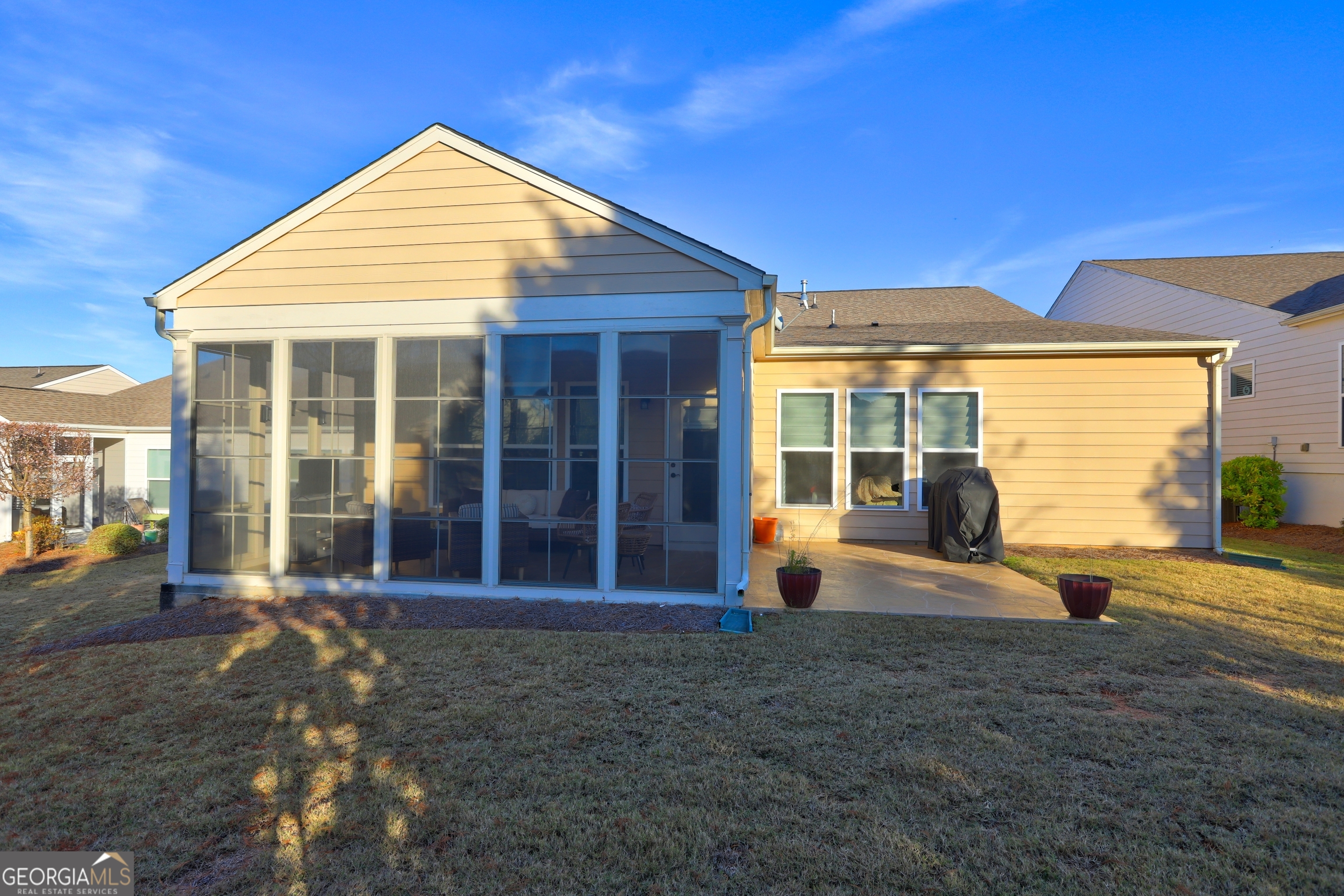 757 Firefly Court Griffin, GA 30223 - Photo 3 of 31 a view of a house with backyard porch and sitting area