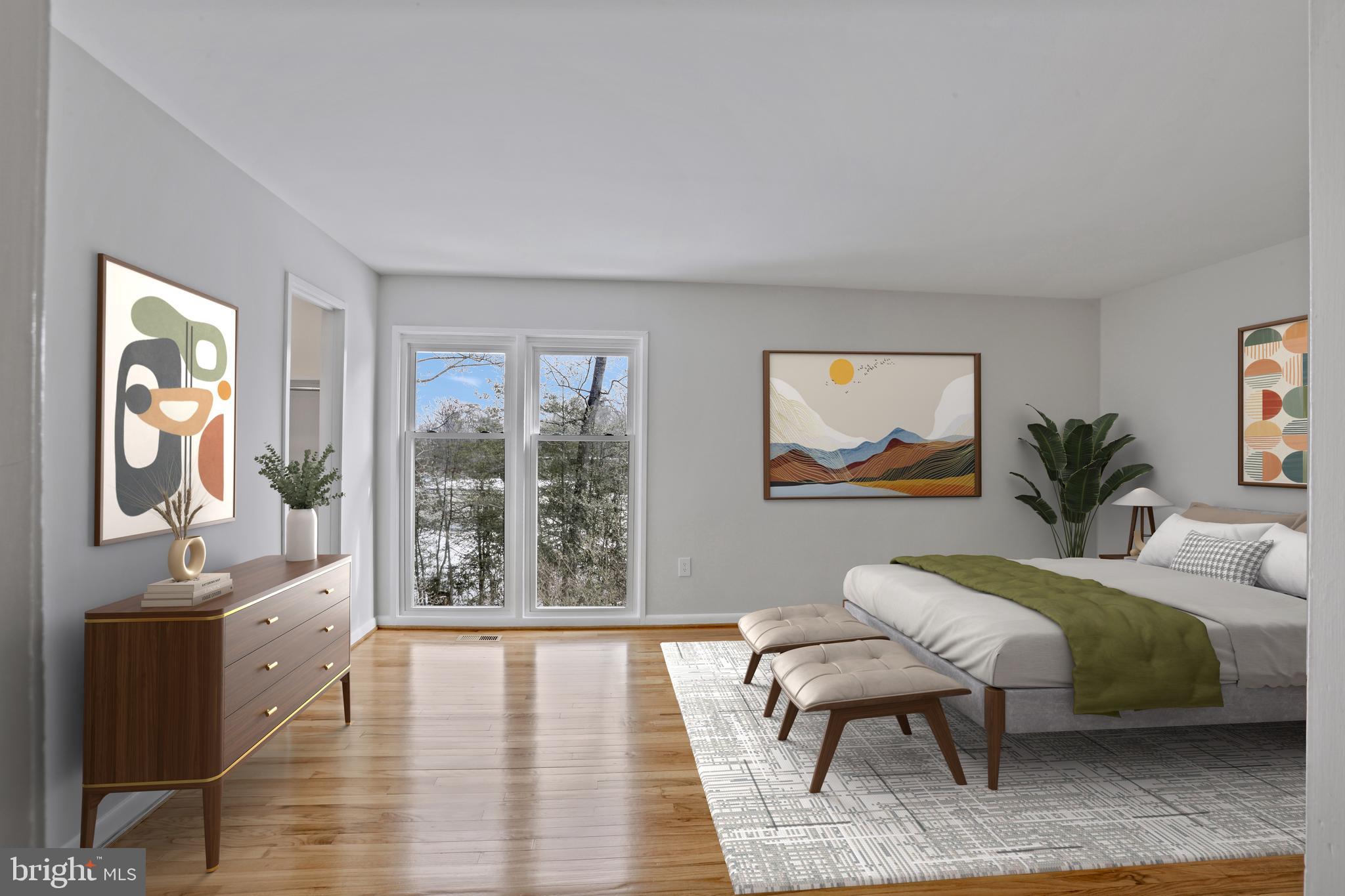 1644 Wainwright Drive Reston, VA 20190 - Photo 17 of 38 a living room with furniture and a large window