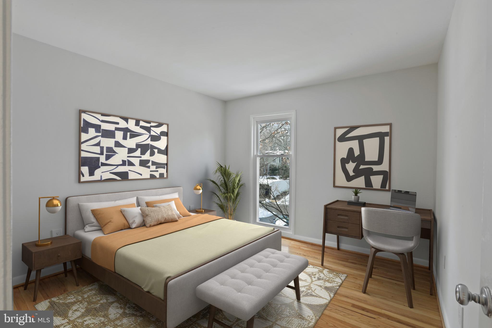 1644 Wainwright Drive Reston, VA 20190 - Photo 23 of 38 a bedroom with a bed and a chair