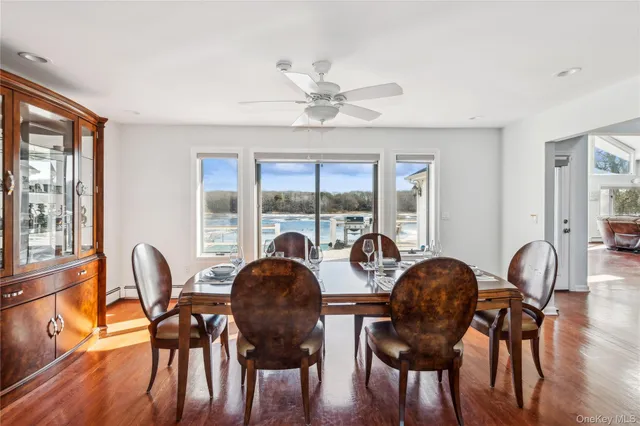 a dining room with furniture window wooden floor