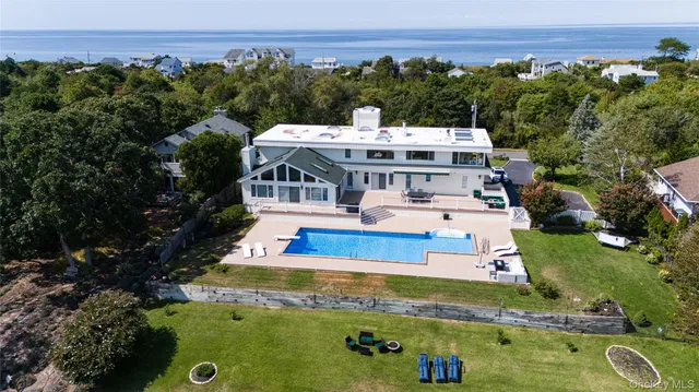an aerial view of a house with a garden
