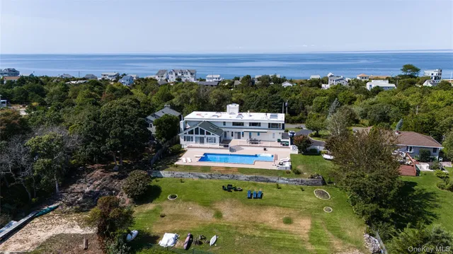 an aerial view of a house with a garden