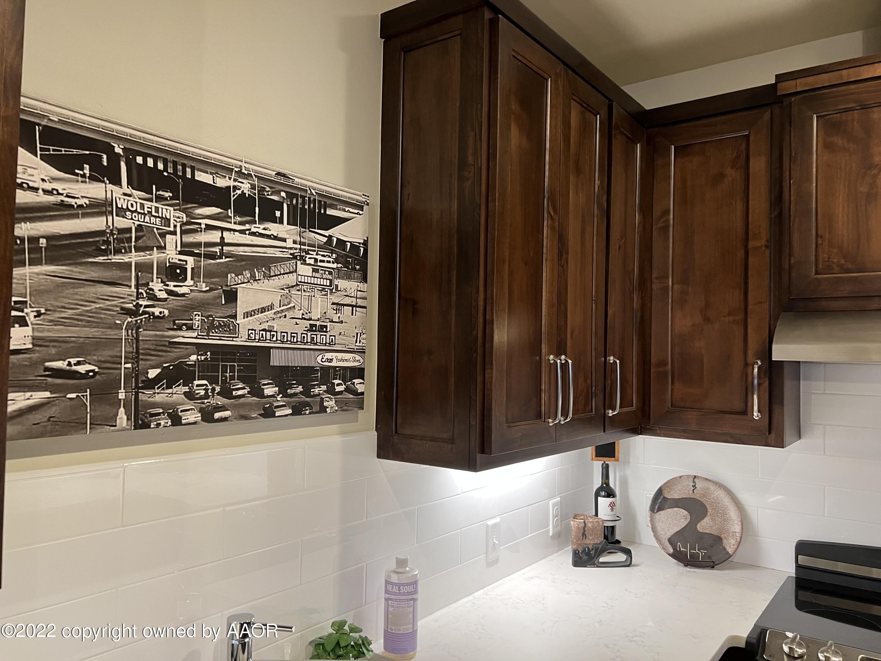 Southeast 10th Amarillo, TX 79101 - Photo 4 of 10 a bathroom with a sink and a mirror