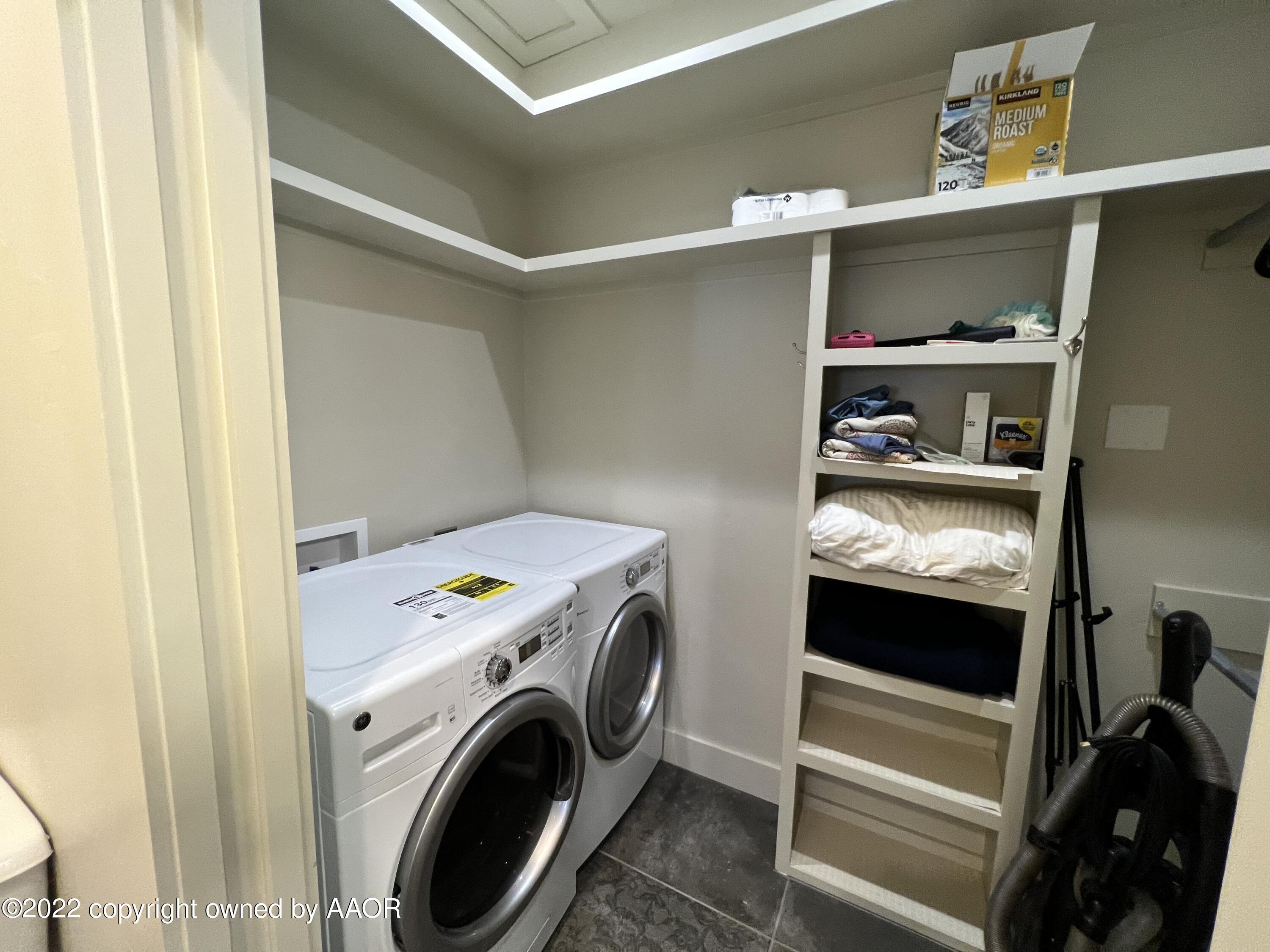 Southeast 10th Amarillo, TX 79101 - Photo 8 of 10 a utility room with dryer and washer