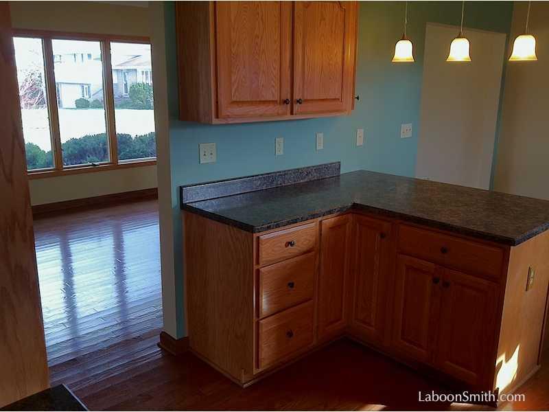 70 Barbara Road Latrobe, PA 15650 - Photo 5 of 25 Kitchen. A view from the eat-in kitchen bar into the living room.