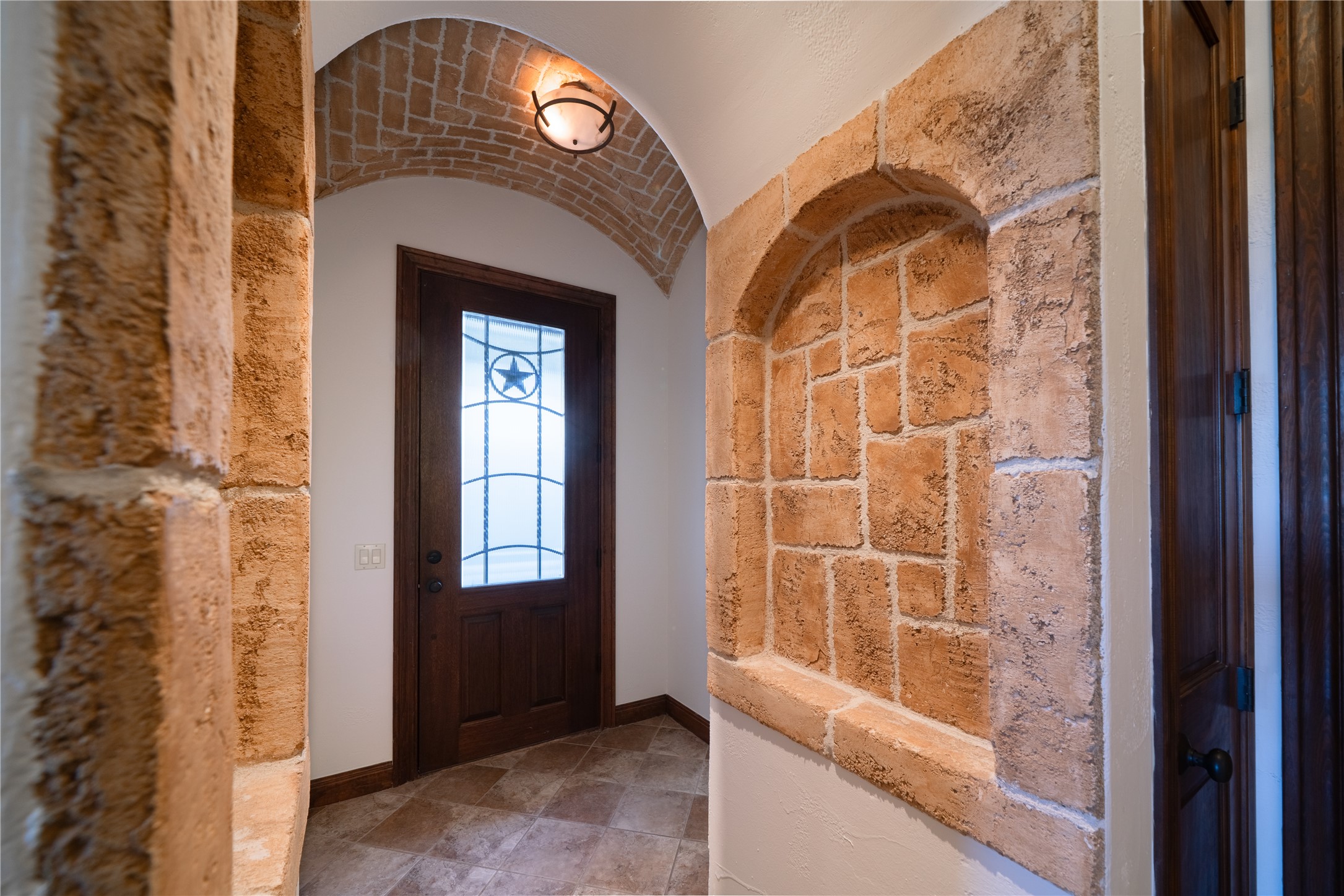 17545 West Reed Park Road, Unit 2 Jonestown, TX 78645 - Photo 6 of 39 a view of front door of a house