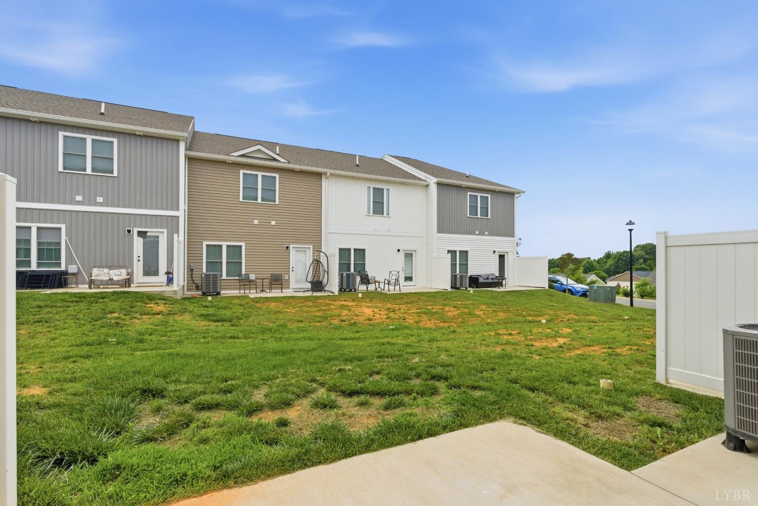 556 Leesville Road, Unit 406 Lynchburg, VA 24502 - Photo 33 of 39 a view of a house with a backyard