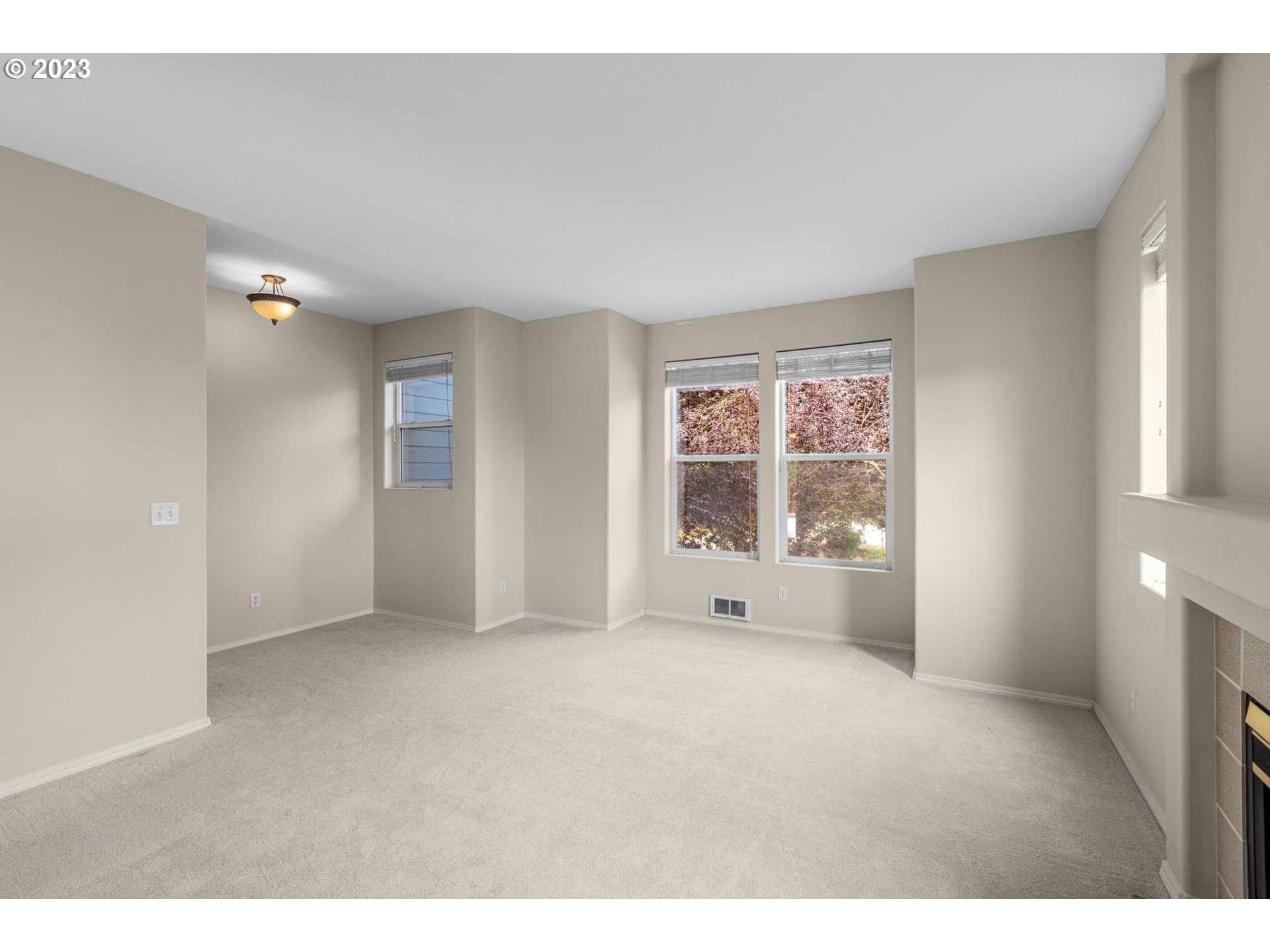 15530 Southwest Peridot Way Beaverton, OR 97007 - Photo 12 of 31 a view of an empty room with a window