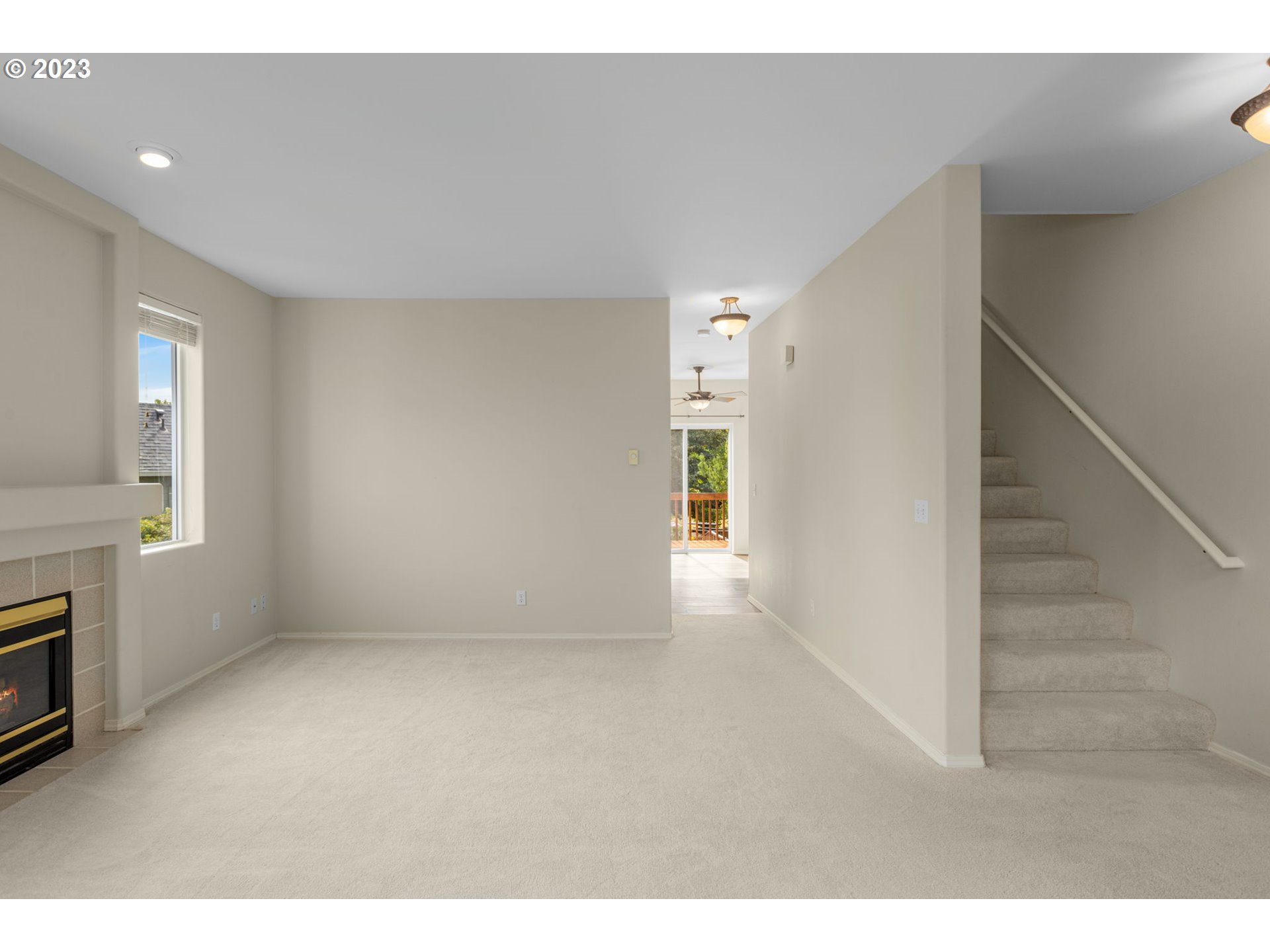 15530 Southwest Peridot Way Beaverton, OR 97007 - Photo 13 of 31 a view of an empty room with a fireplace