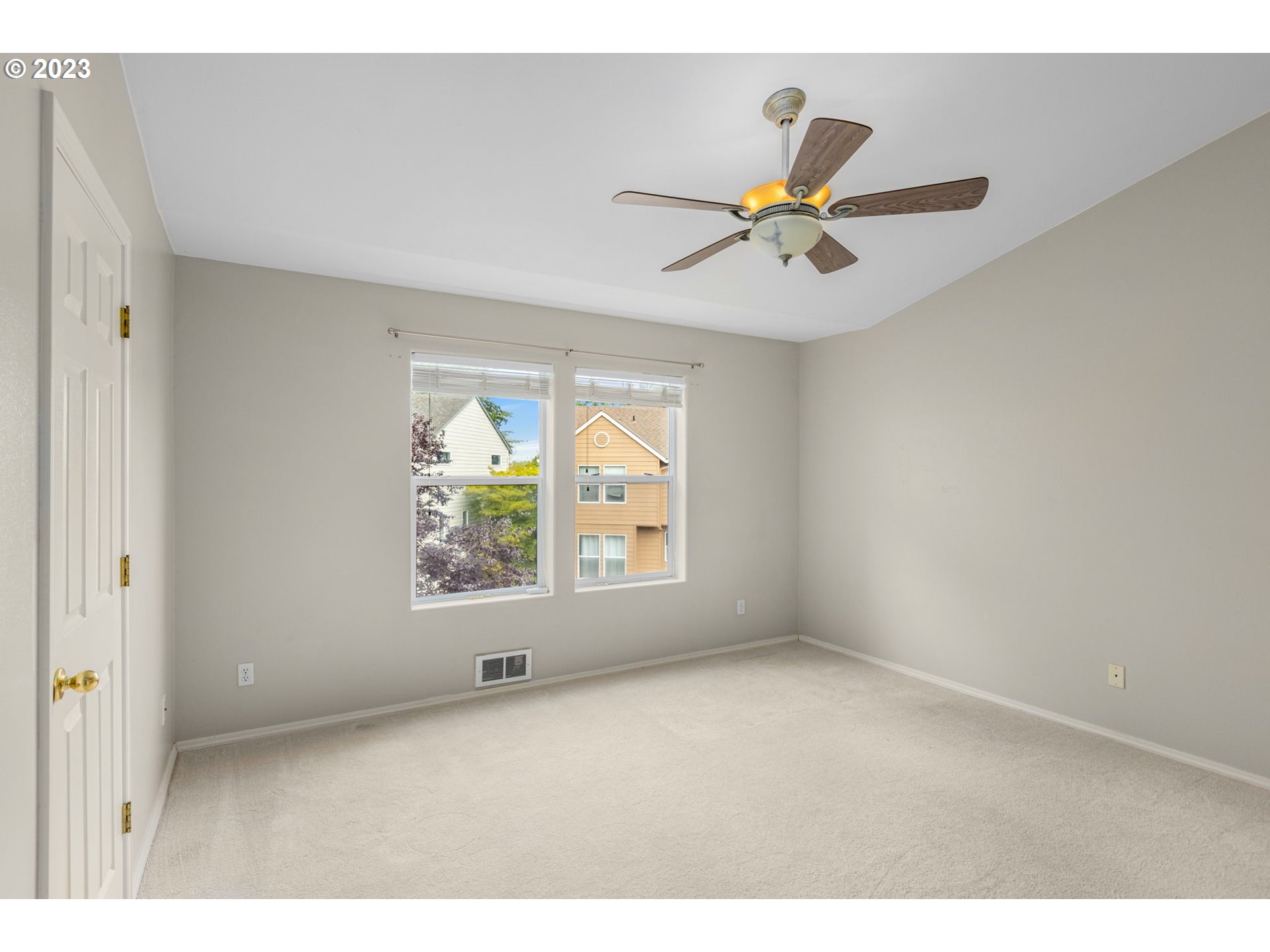 15530 Southwest Peridot Way Beaverton, OR 97007 - Photo 17 of 31 a view of an empty room with a window
