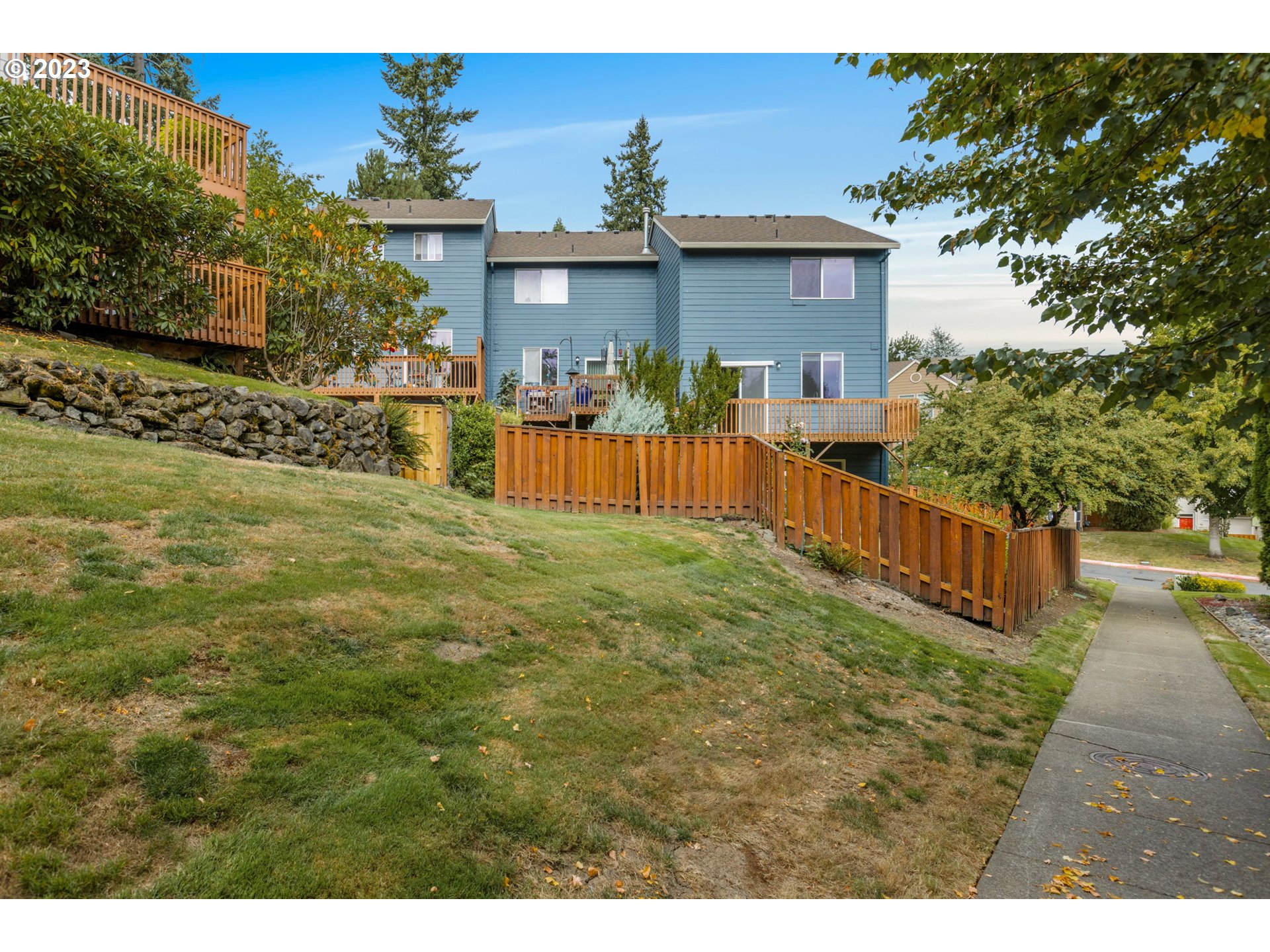 15530 Southwest Peridot Way Beaverton, OR 97007 - Photo 28 of 31 a view of a house with a yard