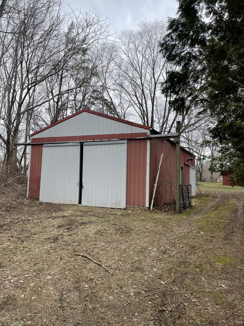 26644 Avers Road Sterling, IL 61081 - Photo 18 of 19 a view of a house with a yard