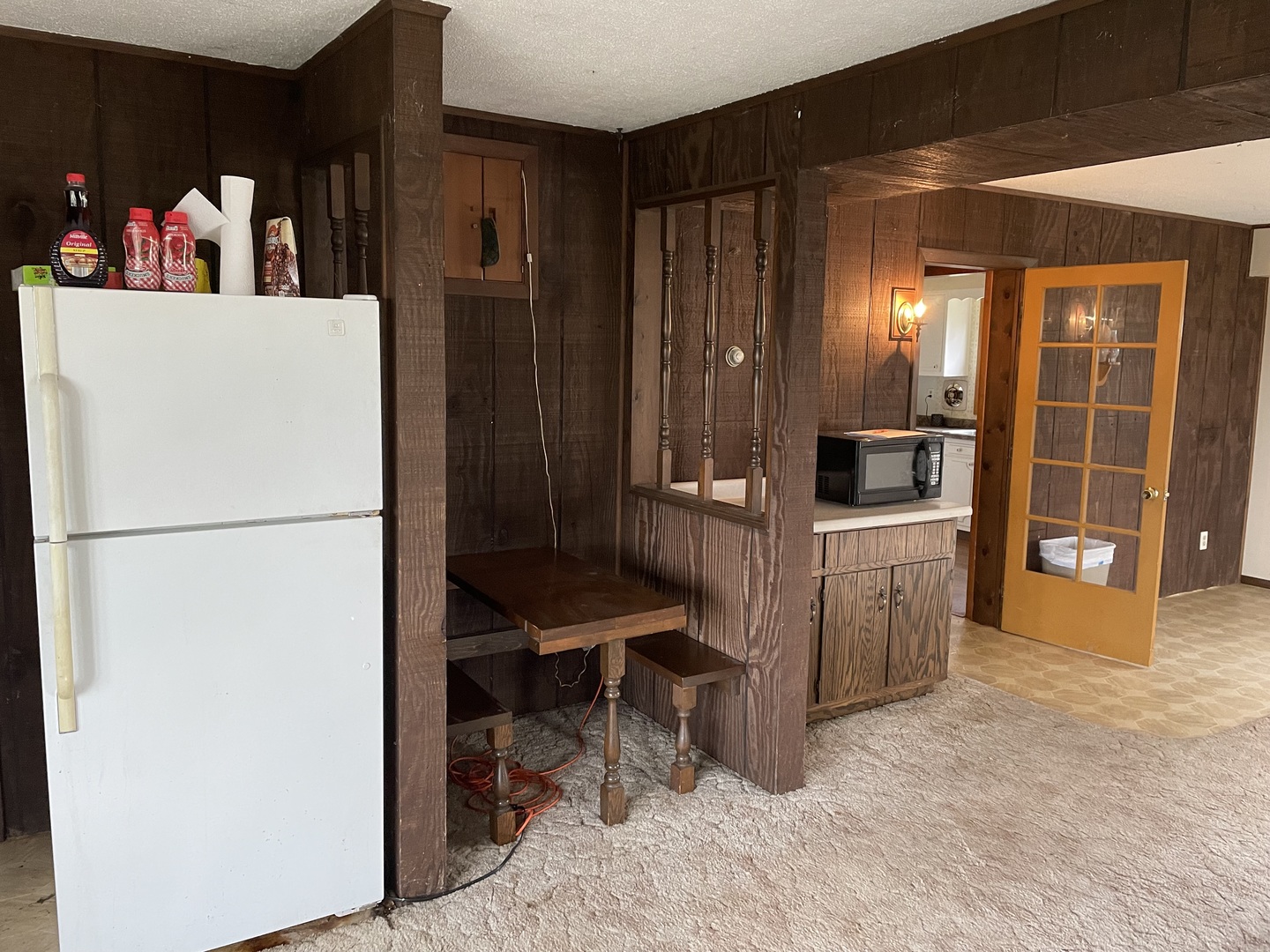 26644 Avers Road Sterling, IL 61081 - Photo 7 of 19 a refrigerator freezer sitting in a kitchen