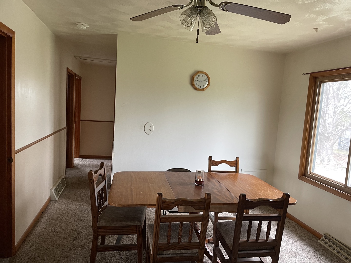 26644 Avers Road Sterling, IL 61081 - Photo 8 of 19 a view of a dining room with furniture and window