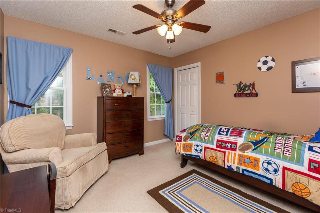 3310 Timberwolf Avenue High Point, NC 27265 - Photo 18 of 24 BEDROOM WITH SO MUCH SPACE OVERLOOKS BEAUTIFUL BACK YARD