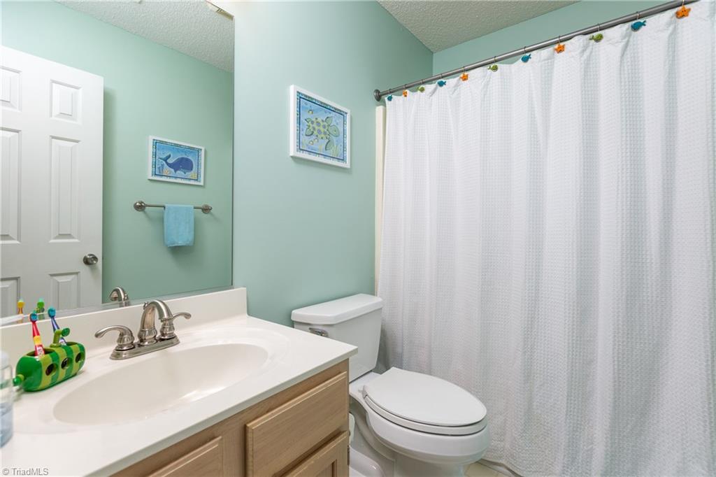 3310 Timberwolf Avenue High Point, NC 27265 - Photo 19 of 24 BATHROOM SERVICES BEDROOM 2&3. GREAT COLOR CHOICE!!