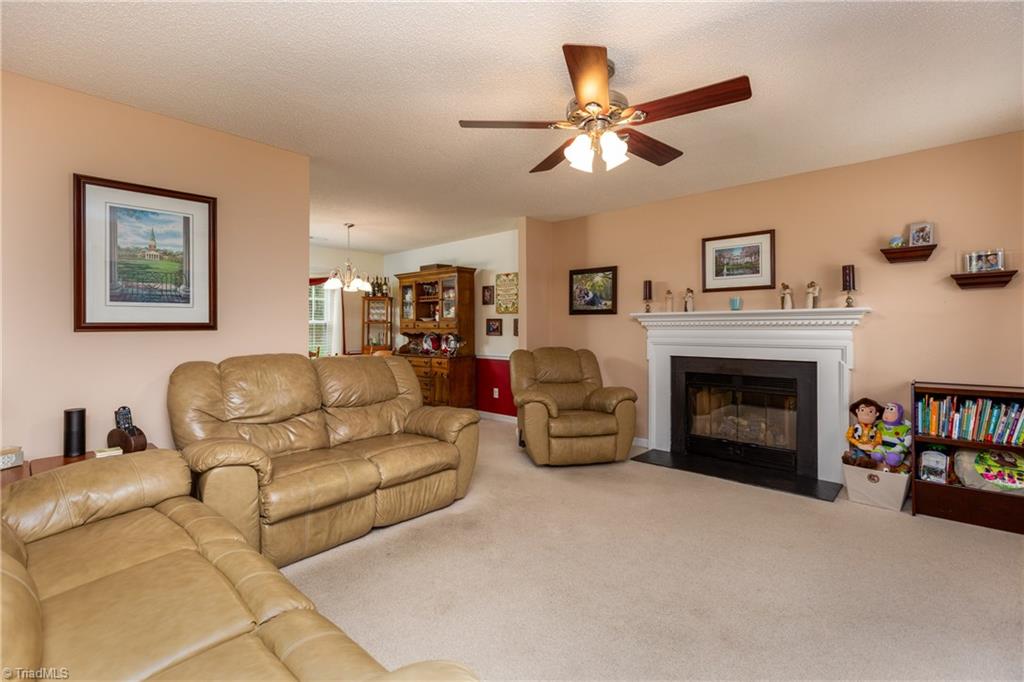 3310 Timberwolf Avenue High Point, NC 27265 - Photo 3 of 24 LIVING ROOM WITH GAS FIREPLACE