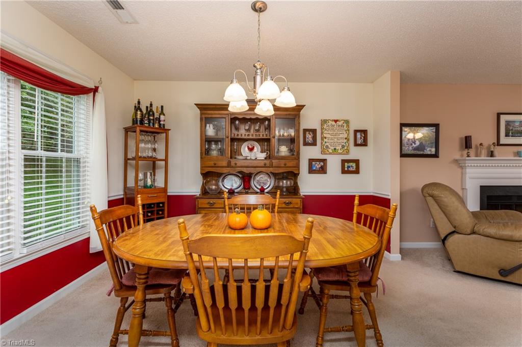 3310 Timberwolf Avenue High Point, NC 27265 - Photo 7 of 24 HOLIDAY MEALS CAN TRULY BE ENJOYED IN THIS SPACIOUS DINING AREA